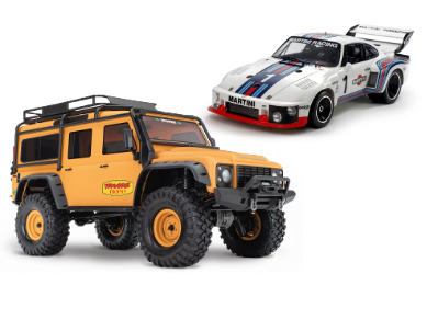 Maquette � construire Porsche de la marque TAMIYA et voiture radiocommand�e �lectrique TRX4 Land Rover de la marque TRAXXAS